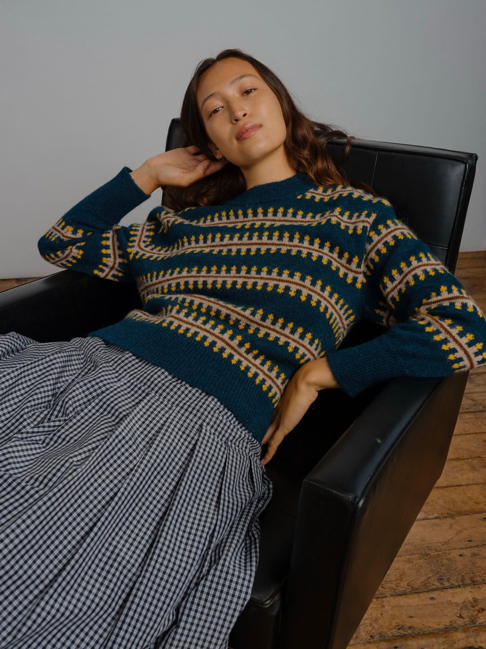 The Endery Vera Fairisle Sweater in Juniper — a deep teal fair isle knit banded with mustard, cream and warm brown, in alpaca