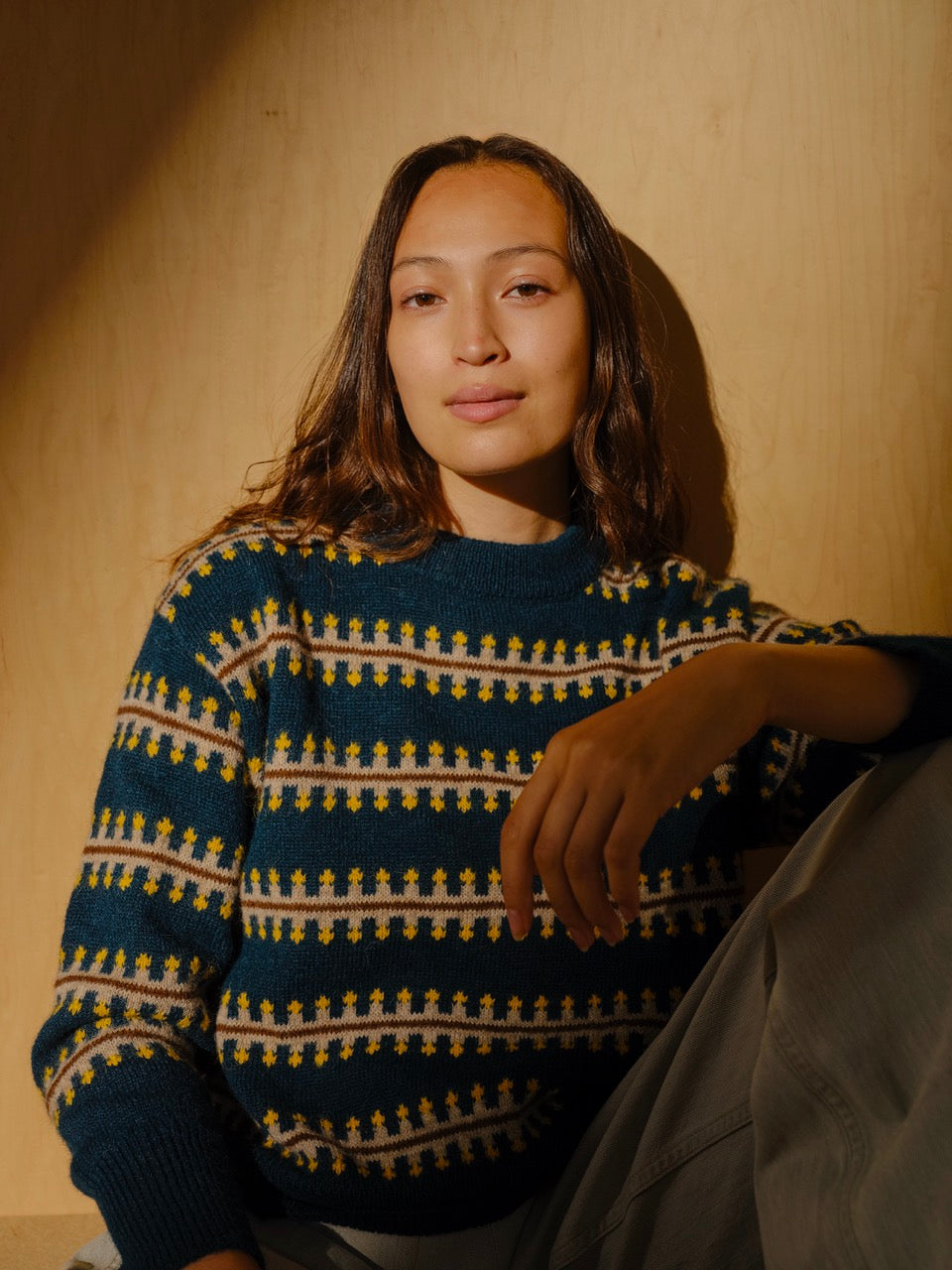 The Endery Vera Fairisle Sweater in Juniper — a deep teal fair isle knit banded with mustard, cream and warm brown, in alpaca